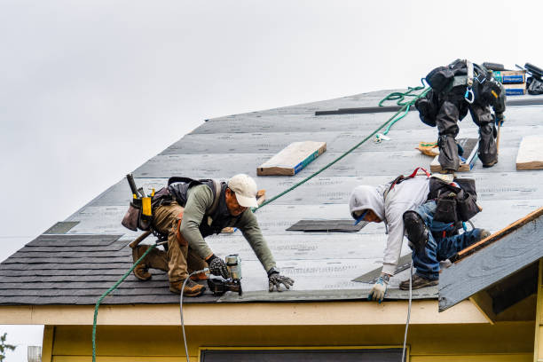 Professional Roof Replacement technician working in Saco, ME